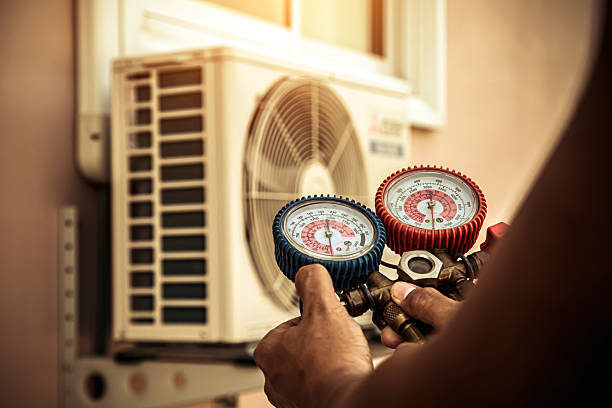 Professional Heat Pump Repair technician working in New Boston, NH